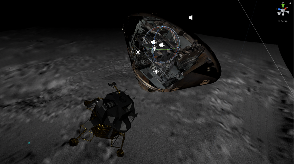 Screen capture, 3D rendering of the Command Module and Lunar Module immediately after separation, with grey landscape below. There are various lightbulb and speaker icons superimposed on the Command Module, and coordinates icon (x, y, z) in the top right.